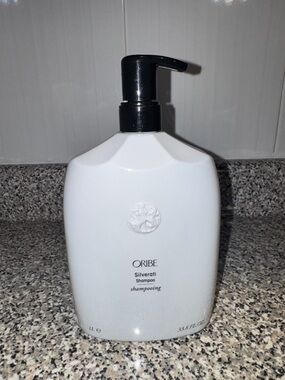 Oribe White Bottle with Black Pump Shampoo 33.8oz
